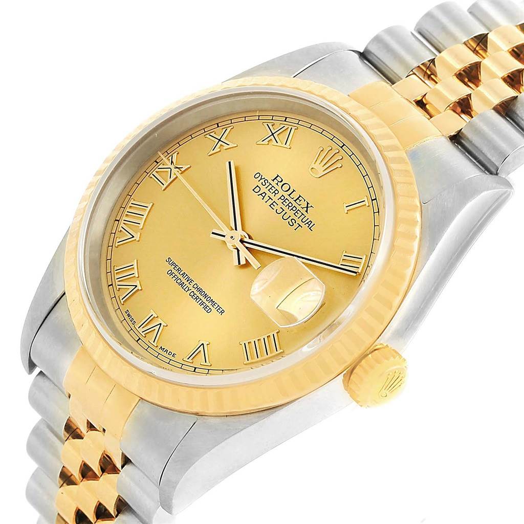 This image shows a gold and silver Rolex Datejust 16233 Men's Steel and Gold (two tone) Champagne Dial 16233 Men's Steel and Gold (two tone) Champagne Dial model watch from an angled top view, highlighting the dial, bezel, and part of the bracelet.