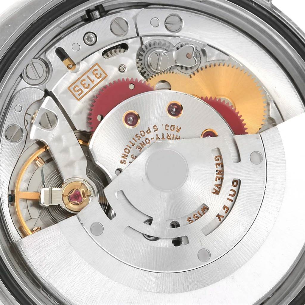 This image shows an up-close view of the internal mechanism and movement of a Rolex Datejust 116233 Men's Stainless Steel Champagne Dial 116233 Men's Stainless Steel Champagne Dial model watch.