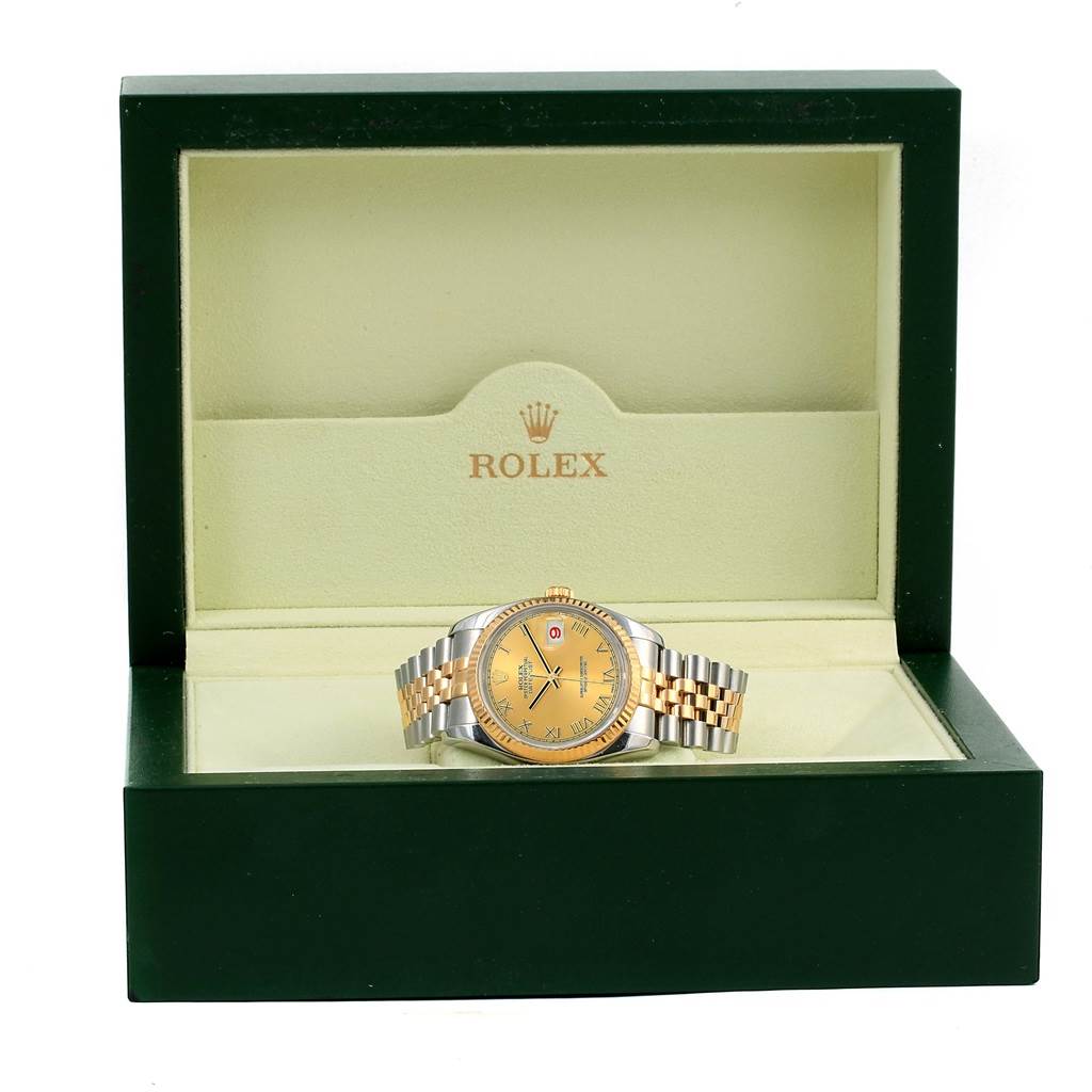 The image shows a Rolex Datejust 116233 Men's Stainless Steel Champagne Dial 116233 Men's Stainless Steel Champagne Dial watch inside its open green box, displaying the face and bracelet from a front angle.