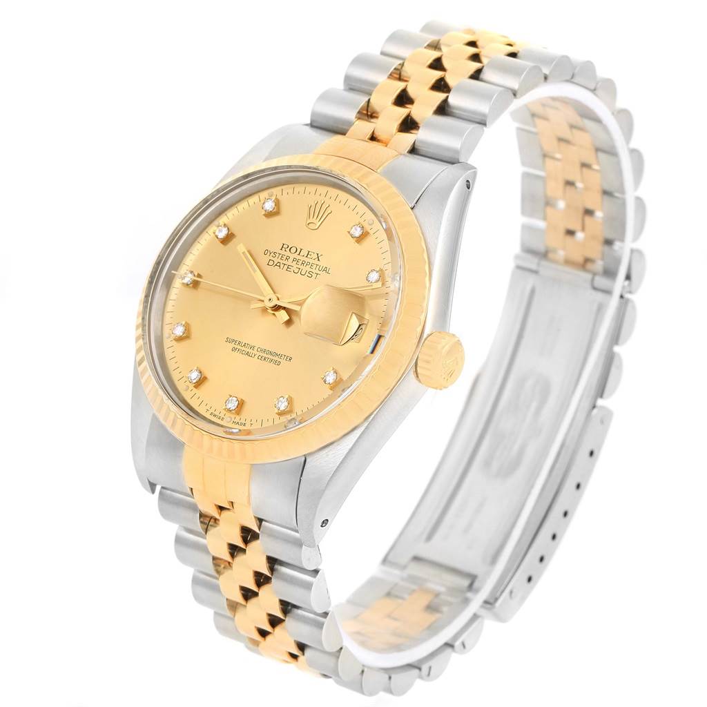The image shows a tilted side view of the Rolex Datejust 16013 Men's Stainless Steel Champagne Dial 16013 Men's Stainless Steel Champagne Dial watch, highlighting its face, crown, and bracelet.