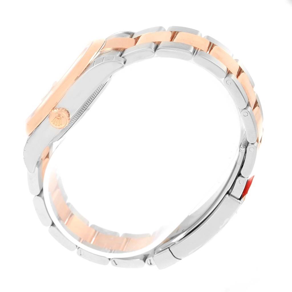 This image shows a side view of the Rolex Datejust 116201 Steel and Gold (two tone) Grey Dial 116201 Steel and Gold (two tone) Grey Dial watch, highlighting its bracelet and crown.