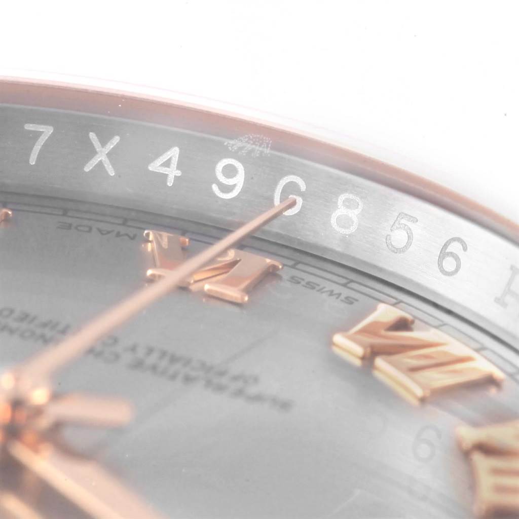The image shows a close-up of the serial number engraving on the rehaut of a Rolex Datejust 116201 Steel and Gold (two tone) Grey Dial 116201 Steel and Gold (two tone) Grey Dial watch.