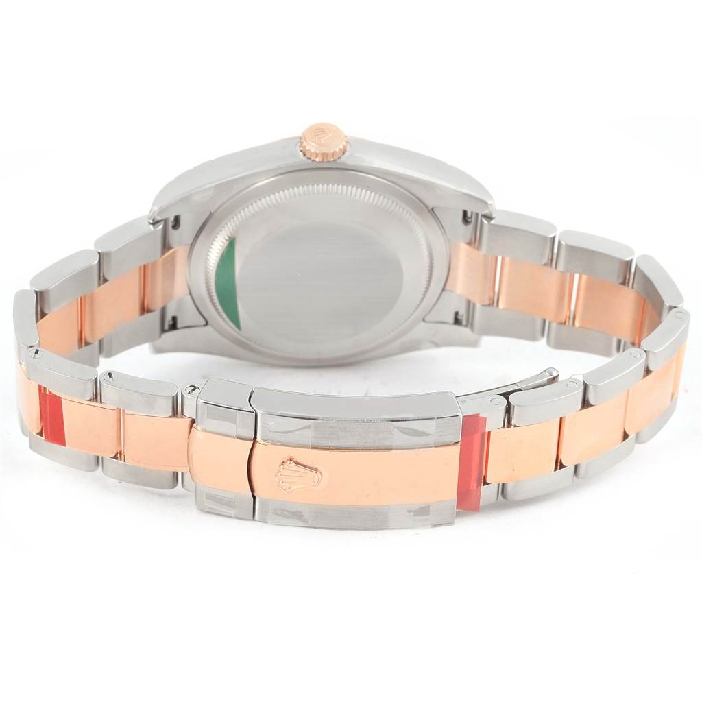 The image shows the backside and clasp of a Rolex Datejust 116201 Steel and Gold (two tone) Grey Dial 116201 Steel and Gold (two tone) Grey Dial watch, highlighting the bracelet and case back.