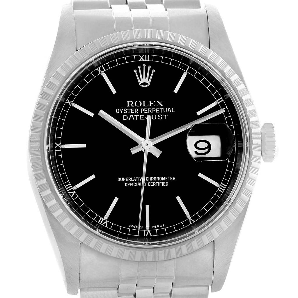 The image shows a front-angle view of a Rolex Datejust 16220 Men's Stainless Steel Black Dial 16220 Men's Stainless Steel Black Dial watch, highlighting its black dial, fluted bezel, and part of the bracelet.