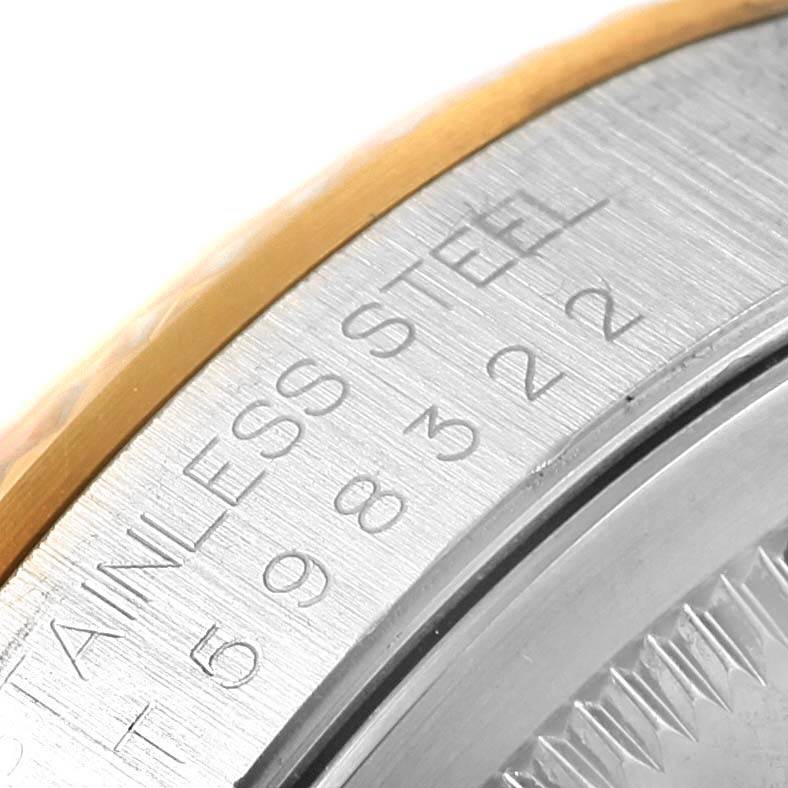 This image shows a close-up of the case back and the serial number engraving on a Rolex Datejust 16233 Men's Steel and Gold (two tone) Beige Dial 16233 Men's Steel and Gold (two tone) Beige Dial watch.