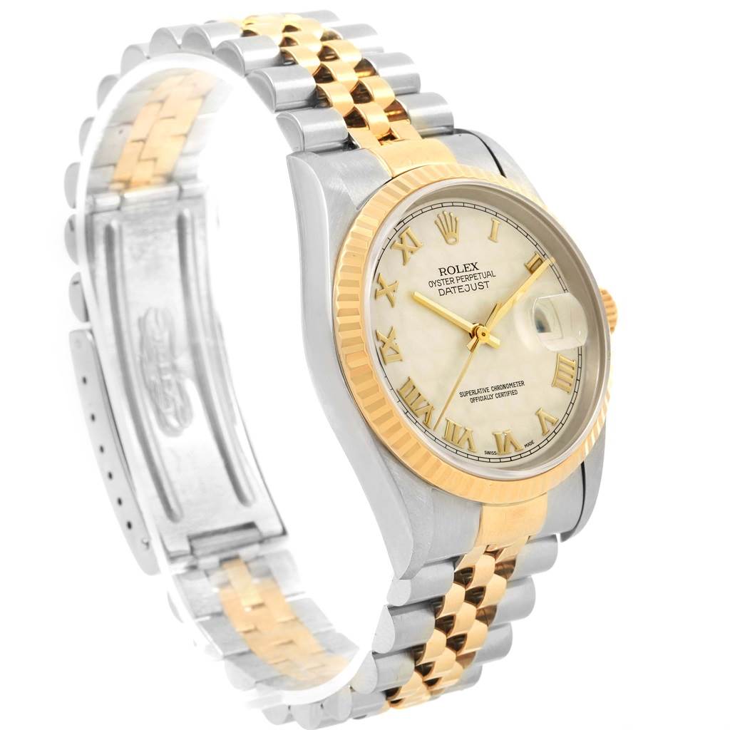 This image shows the side angle of a Rolex Datejust 16233 Men's Steel and Gold (two tone) Beige Dial 16233 Men's Steel and Gold (two tone) Beige Dial watch, highlighting its two-tone metal bracelet and fluted bezel.