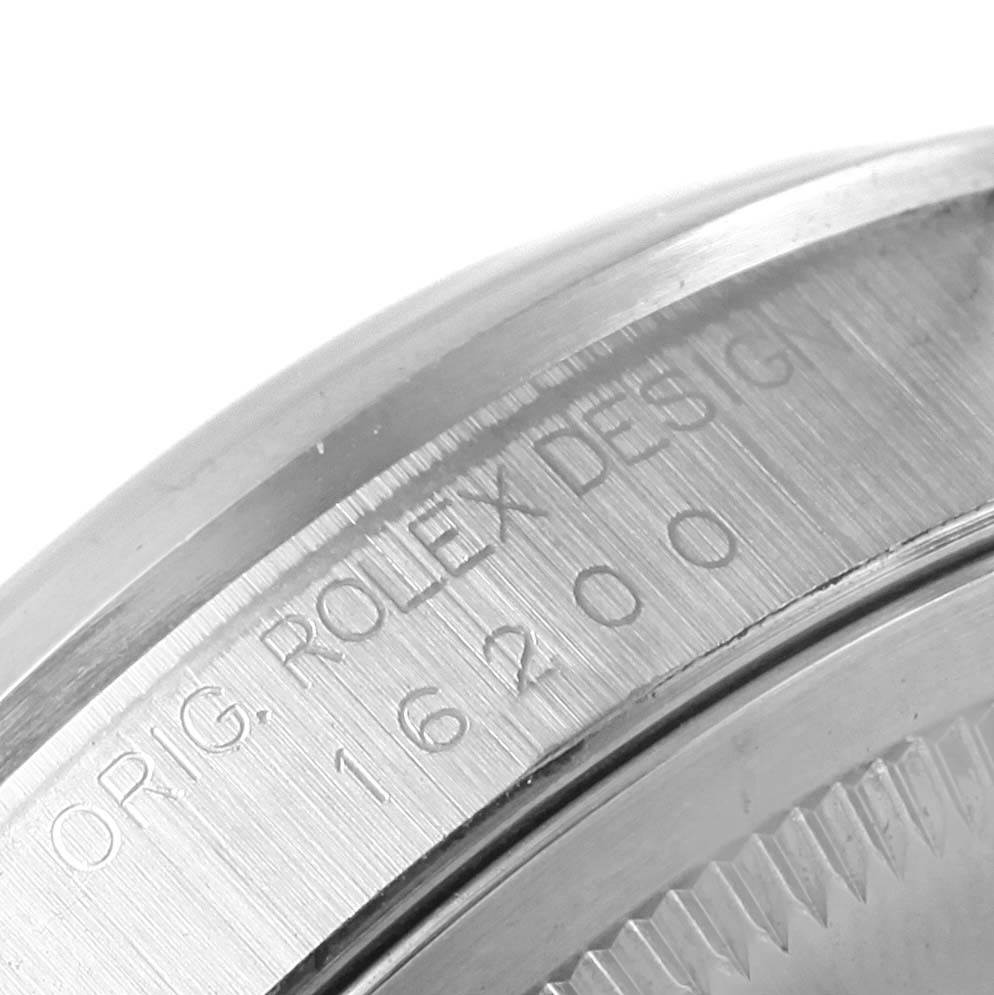 This image shows a close-up of the Rolex Datejust 16200 Men's Stainless Steel Black Dial 16200 Men's Stainless Steel Black Dial model's case side, highlighting the engraved design details and model number 16200.