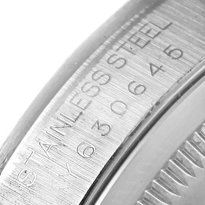 This close-up shows the detailed engraving on the stainless steel casing of the Rolex Datejust 16200 Men's Stainless Steel Black Dial 16200 Men's Stainless Steel Black Dial model watch.