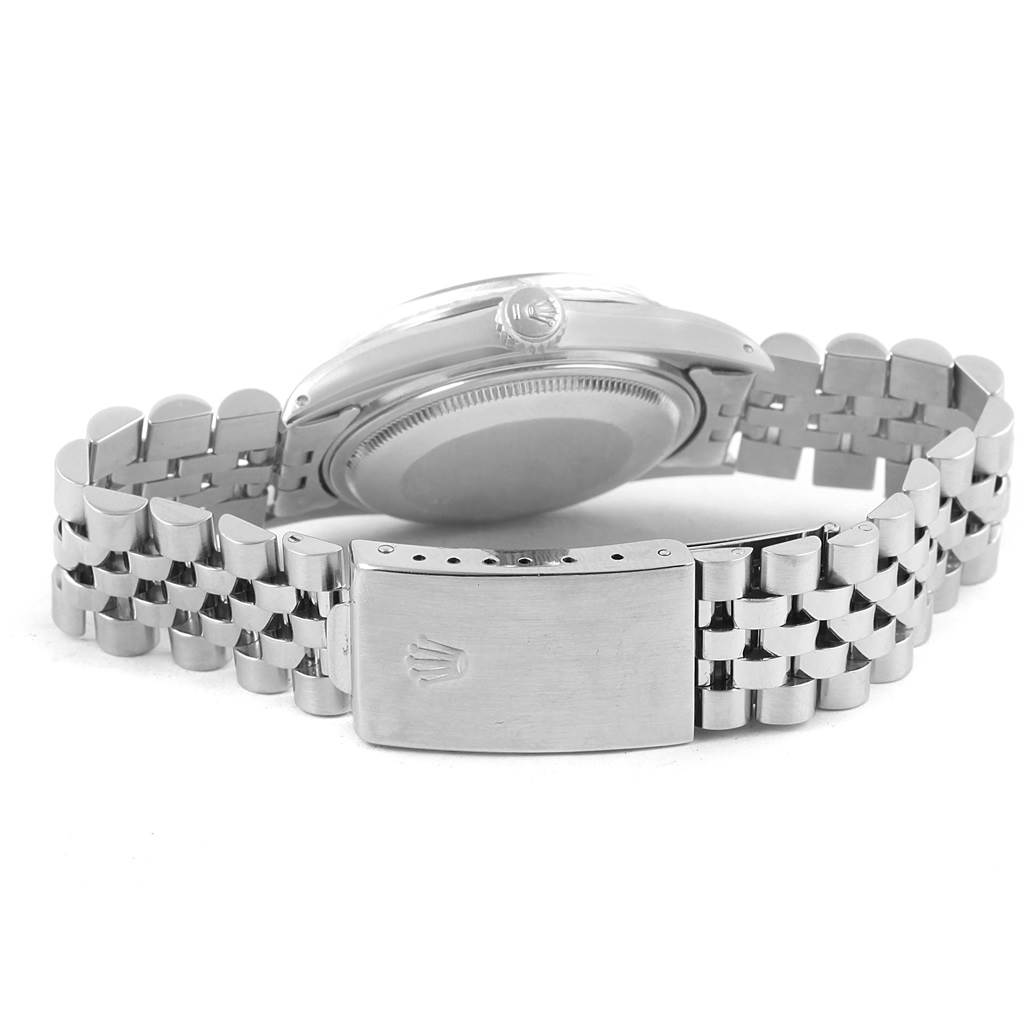 The image shows a Rolex Datejust 16030 Men's Stainless Steel Silver Dial 16030 Men's Stainless Steel Silver Dial watch from the back, highlighting the case, crown, and bracelet with a clasp.