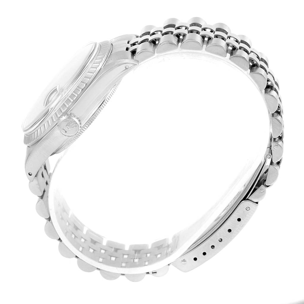 The image shows a side profile of the Rolex Datejust 16030 Men's Stainless Steel Silver Dial 16030 Men's Stainless Steel Silver Dial watch, highlighting its case and bracelet.