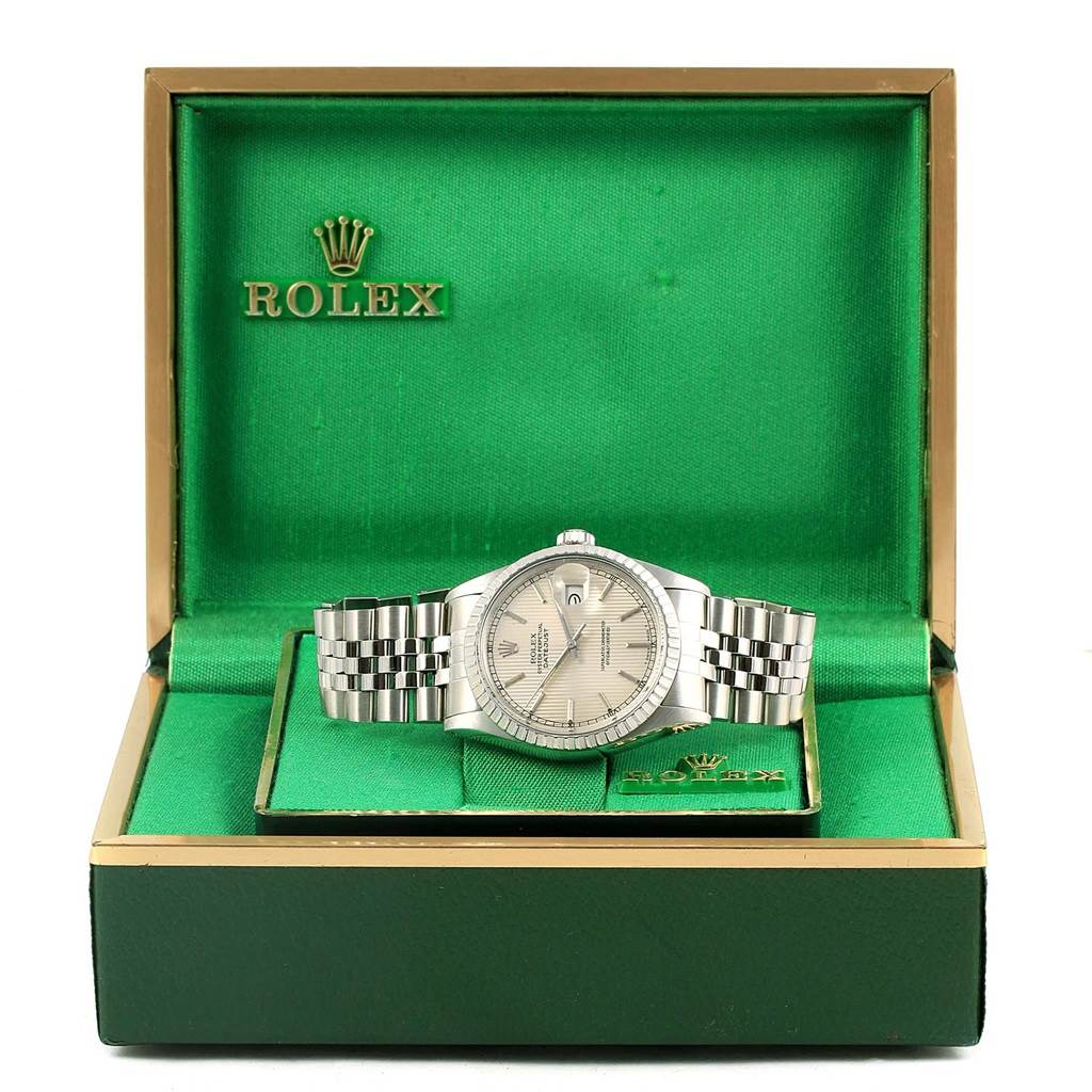 The Rolex Datejust 16030 Men's Stainless Steel Silver Dial 16030 Men's Stainless Steel Silver Dial watch is shown from the front in an open green box with the Rolex logo.