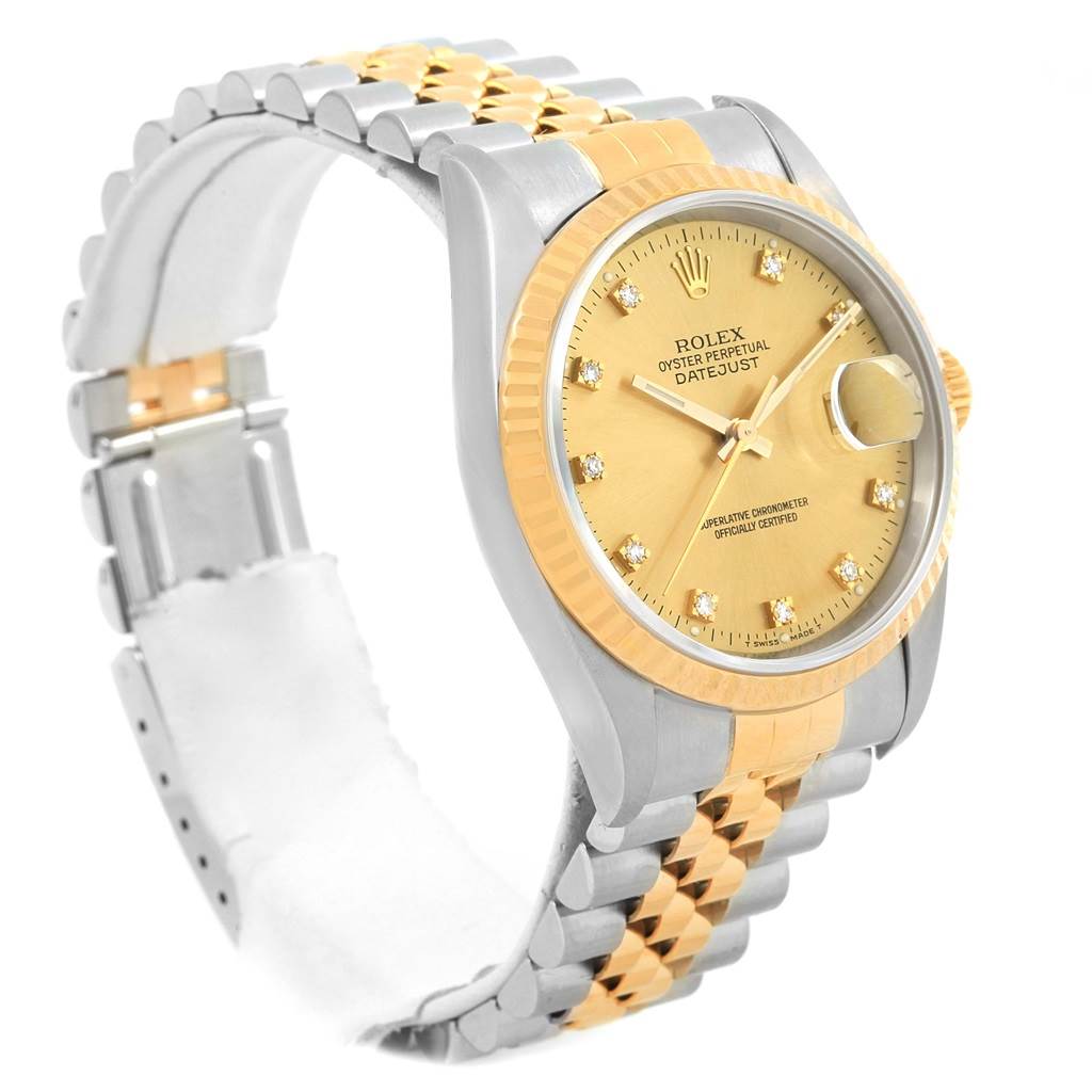 This image shows a Rolex Datejust 16233 Men's Steel and Gold (two tone) Champagne Dial 16233 Men's Steel and Gold (two tone) Champagne Dial watch, angled to display the face, bezel, and two-tone bracelet.