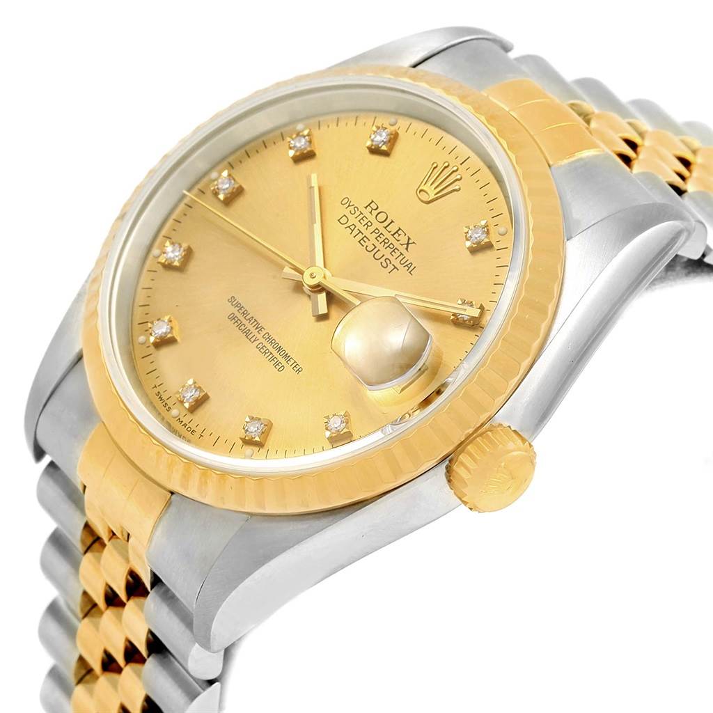 The image shows a close-up, angled view of the Rolex Datejust 16233 Men's Steel and Gold (two tone) Champagne Dial 16233 Men's Steel and Gold (two tone) Champagne Dial watch, highlighting its gold dial, fluted bezel, crown, and two-tone bracelet.