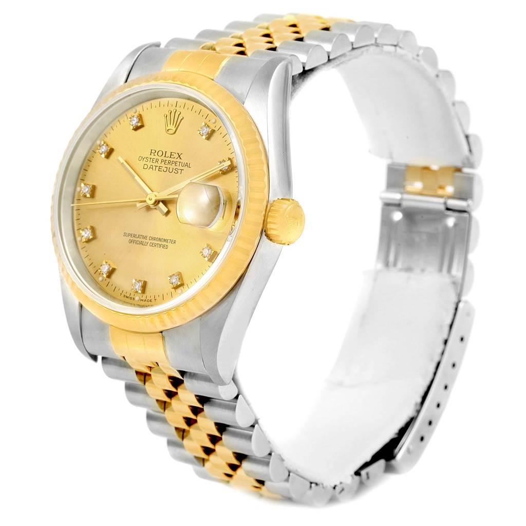 This Rolex Datejust 16233 Men's Steel and Gold (two tone) Champagne Dial 16233 Men's Steel and Gold (two tone) Champagne Dial watch is shown at an angle, highlighting its gold dial, bezel, crown, and two-tone bracelet.