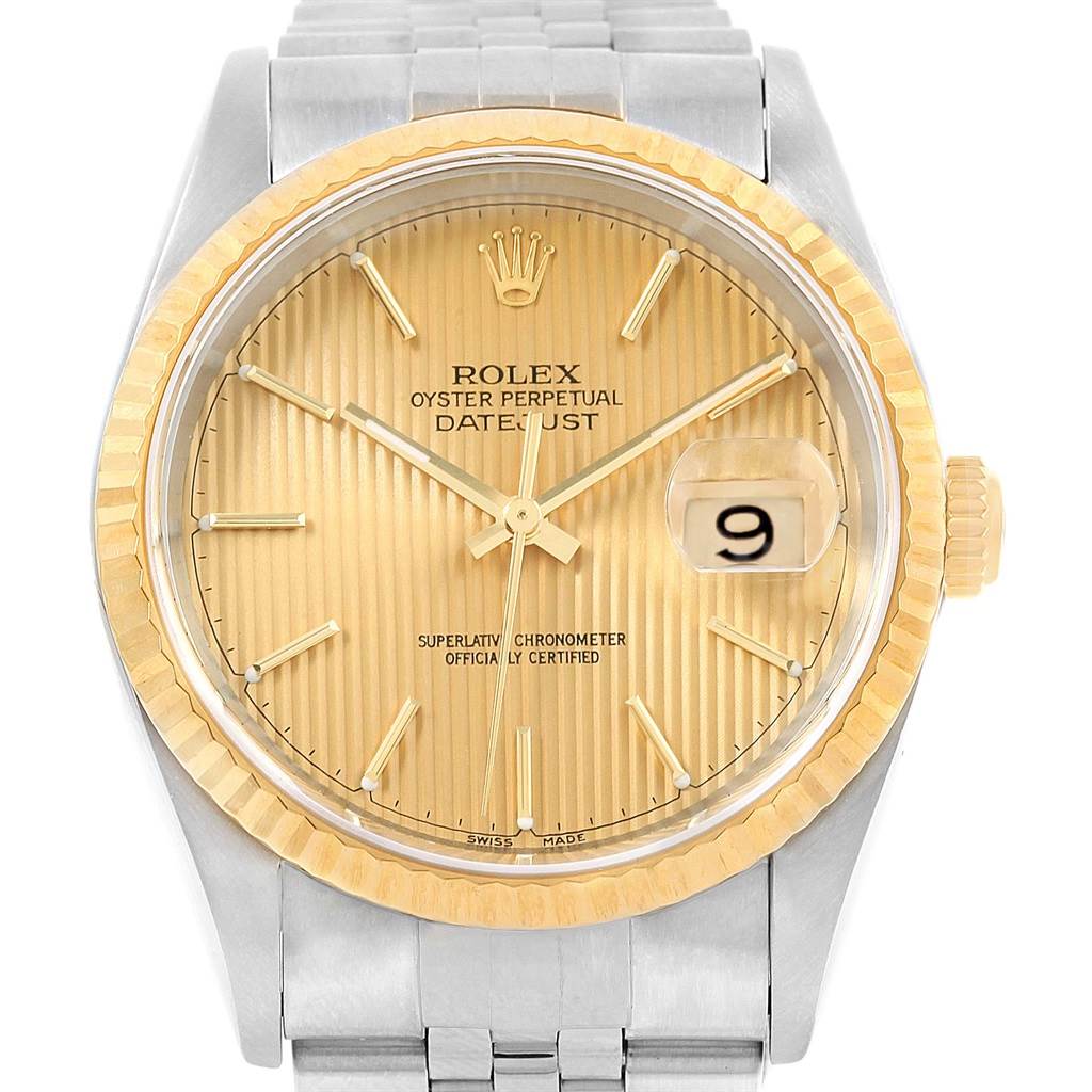 This image shows a front view of the Rolex Datejust 16233 Men's Steel and Gold (two tone) Champagne Dial 16233 Men's Steel and Gold (two tone) Champagne Dial watch, highlighting the dial, hands, date window, bezel, and part of the bracelet.