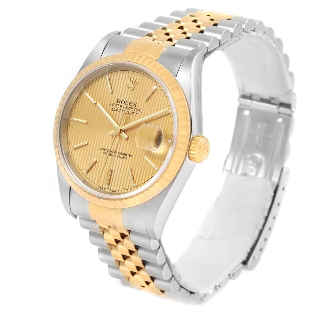 This Rolex Datejust 16233 Men's Steel and Gold (two tone) Champagne Dial 16233 Men's Steel and Gold (two tone) Champagne Dial watch is shown at a three-quarter angle, displaying the dial, bracelet, and crown prominently.