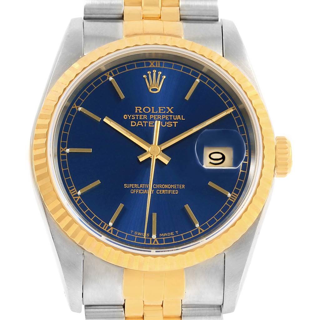 The image shows a Rolex Datejust 16233 Men's Steel and Gold (two tone) Blue Dial 16233 Men's Steel and Gold (two tone) Blue Dial watch from a front view, highlighting the blue dial, gold bezel, and two-tone bracelet.