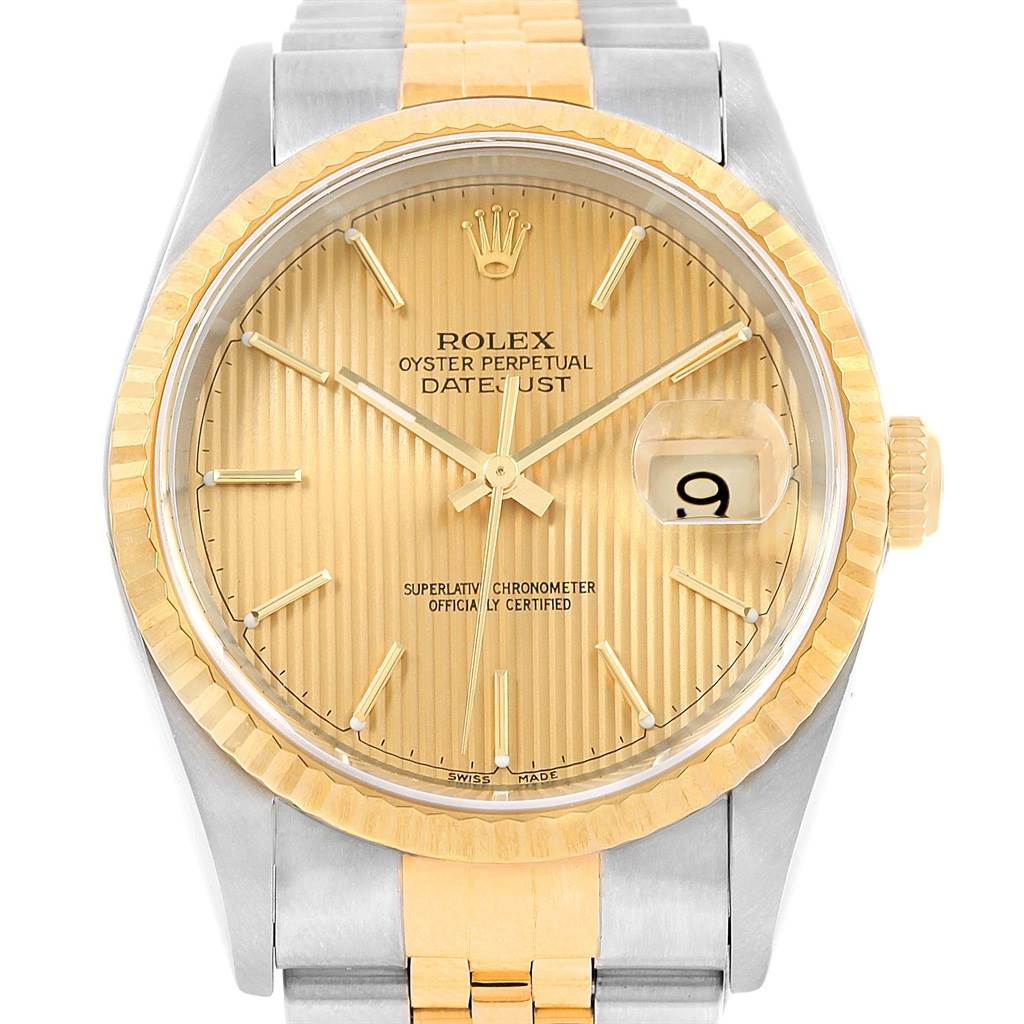 The image shows a close-up of the dial and bezel of the Rolex Datejust 16233 Men's Steel and Gold (two tone) Champagne Dial 16233 Men's Steel and Gold (two tone) Champagne Dial watch.