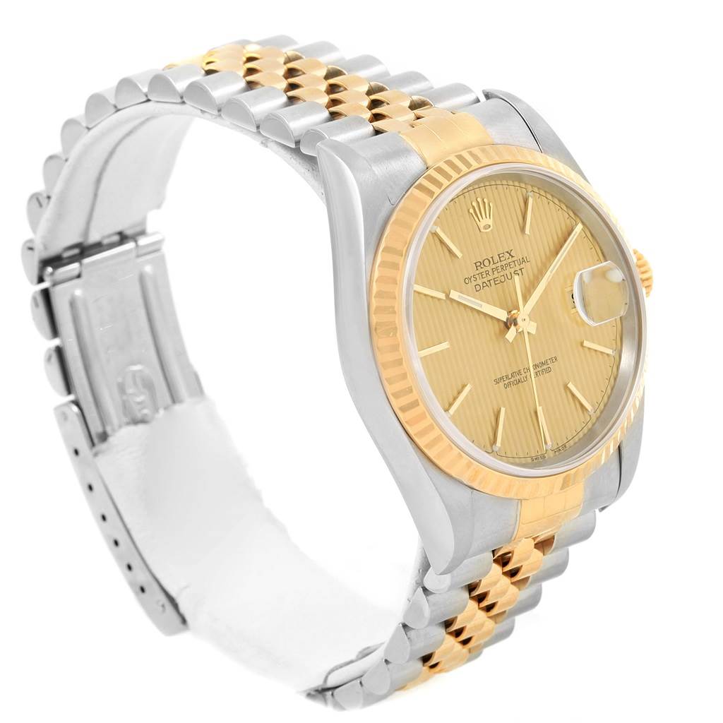 This image shows a side and slightly front angled view of the Rolex Datejust 16233 Men's Steel and Gold (two tone) Champagne Dial 16233 Men's Steel and Gold (two tone) Champagne Dial watch, highlighting its dial, bezel, and bracelet.