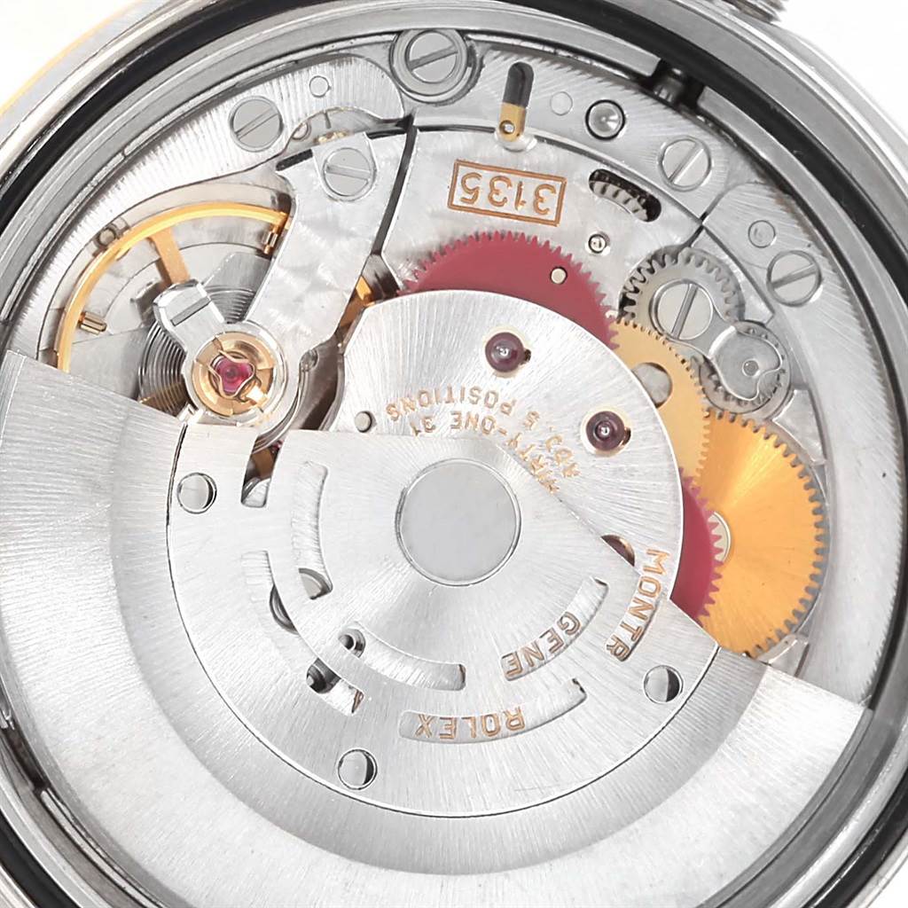 This image shows the inner mechanism and movement of a Rolex Datejust 16233 Men's Steel and Gold (two tone) Champagne Dial 16233 Men's Steel and Gold (two tone) Champagne Dial watch, viewed from the back.