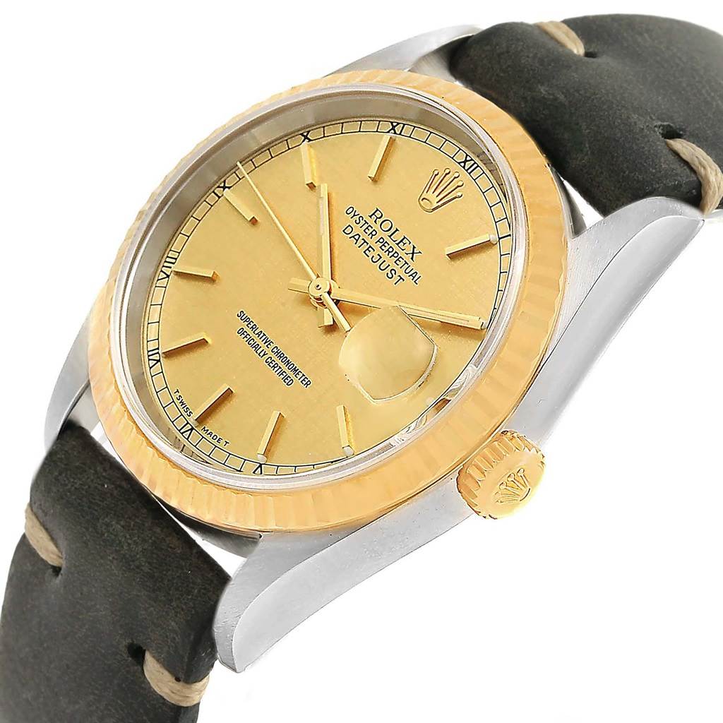 The image shows an angled view of a Rolex Datejust 16233 Men's Steel and Gold (two tone) Champagne Dial 16233 Men's Steel and Gold (two tone) Champagne Dial watch displaying its face, bezel, crown, and part of the strap.