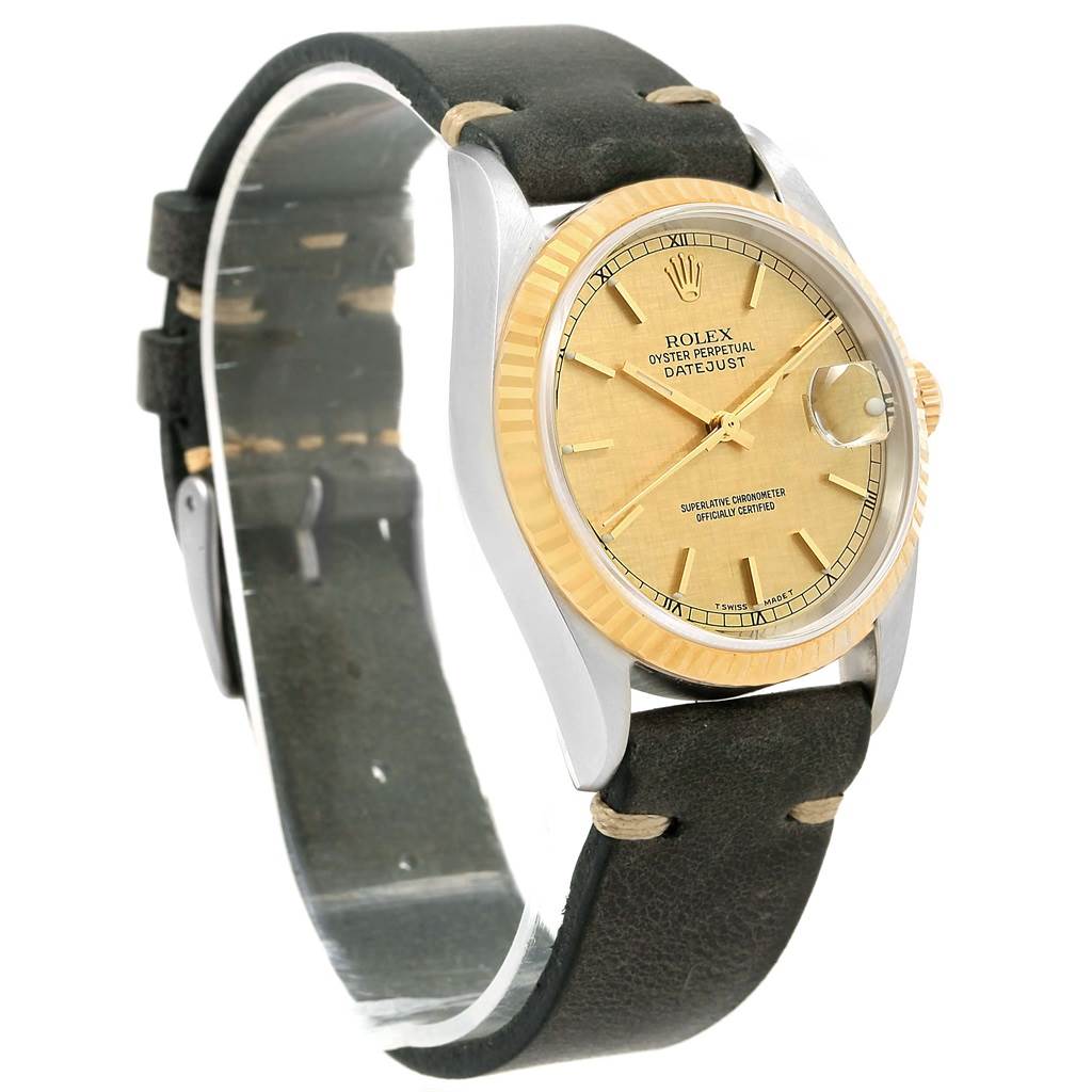 The image shows a Rolex Datejust 16233 Men's Steel and Gold (two tone) Champagne Dial 16233 Men's Steel and Gold (two tone) Champagne Dial watch angled to display the face, bezel, crown, and leather strap.