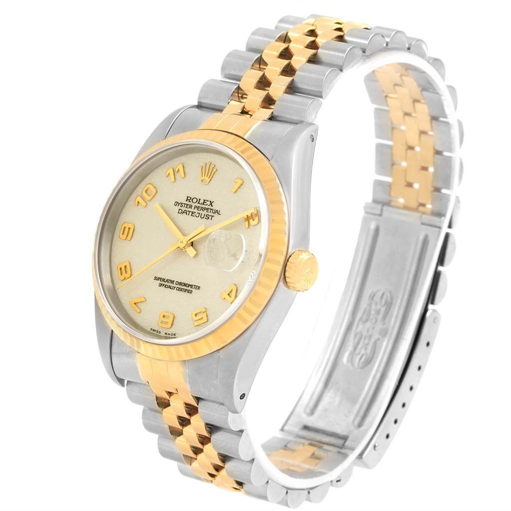 This image shows a side-angle view of the Rolex Datejust 16233 Men's Steel and Gold (two tone) Beige Dial 16233 Men's Steel and Gold (two tone) Beige Dial, highlighting the dial, bezel, and two-tone bracelet.