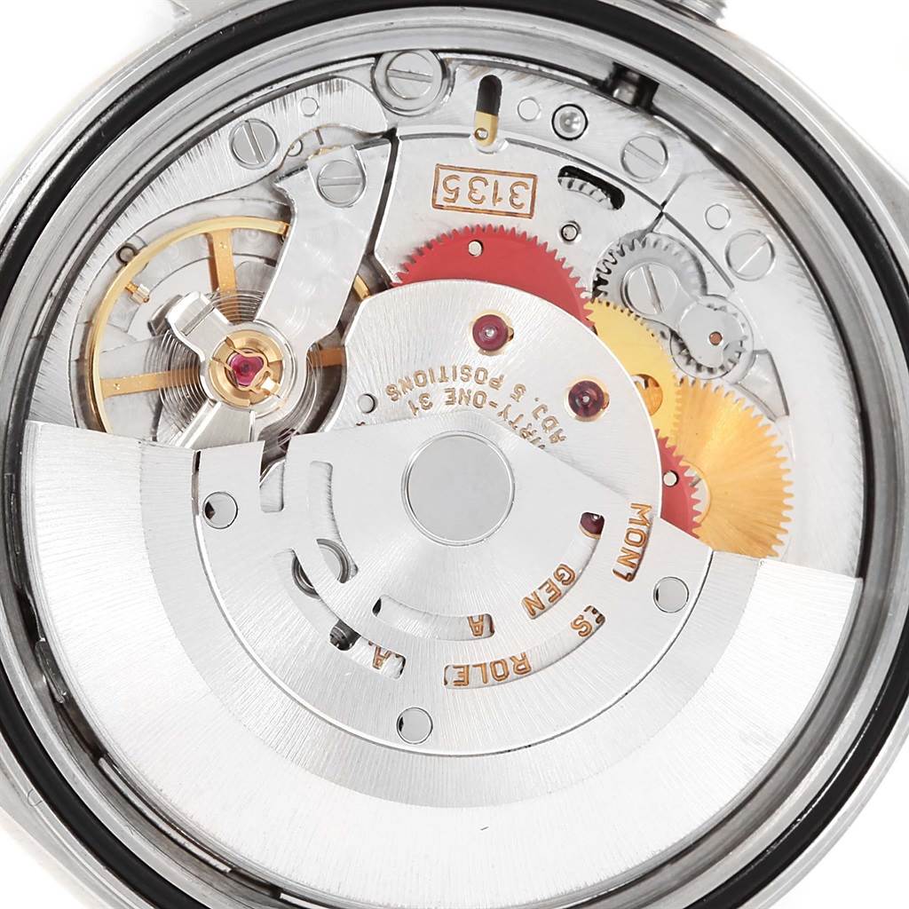 This image shows the intricate movement mechanism of the Rolex Datejust 16233 Men's Steel and Gold (two tone) Beige Dial 16233 Men's Steel and Gold (two tone) Beige Dial model from a back angle.