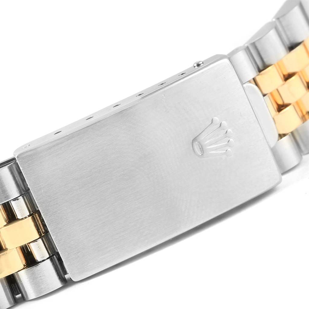 This image shows the clasp of the Rolex Datejust 16233 Men's Steel and Gold (two tone) Beige Dial 16233 Men's Steel and Gold (two tone) Beige Dial watch bracelet from a side angle.