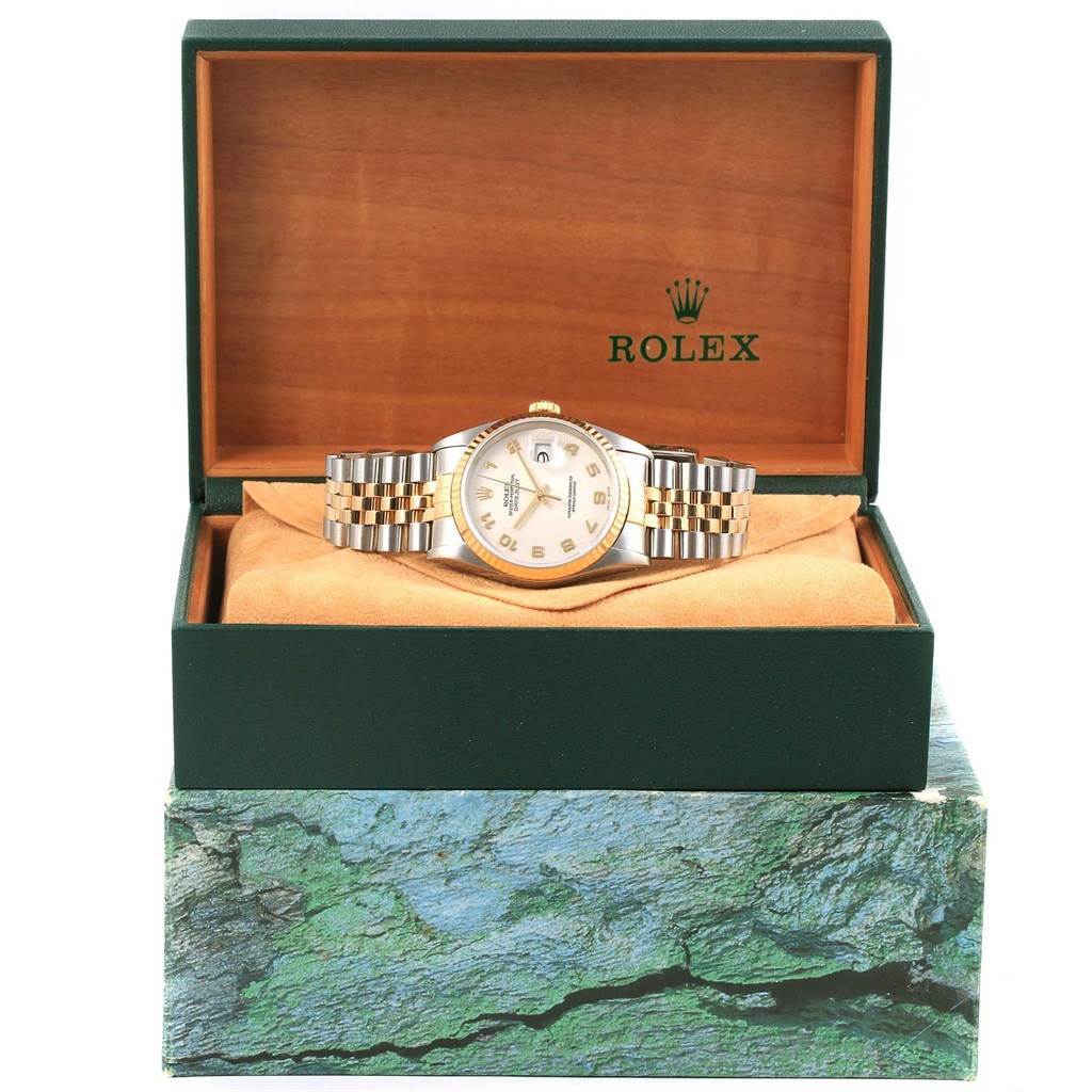 The Rolex Datejust 16233 Men's Steel and Gold (two tone) Beige Dial 16233 Men's Steel and Gold (two tone) Beige Dial watch is shown from the front inside its green and wood-textured presentation box.