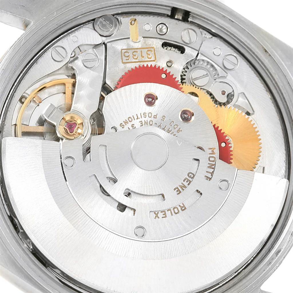 This image shows the movement parts and mechanics of a Rolex Datejust 15223 Men's Steel and Gold (two tone) Blue Dial 15223 Men's Steel and Gold (two tone) Blue Dial watch from a rear, open-case angle.