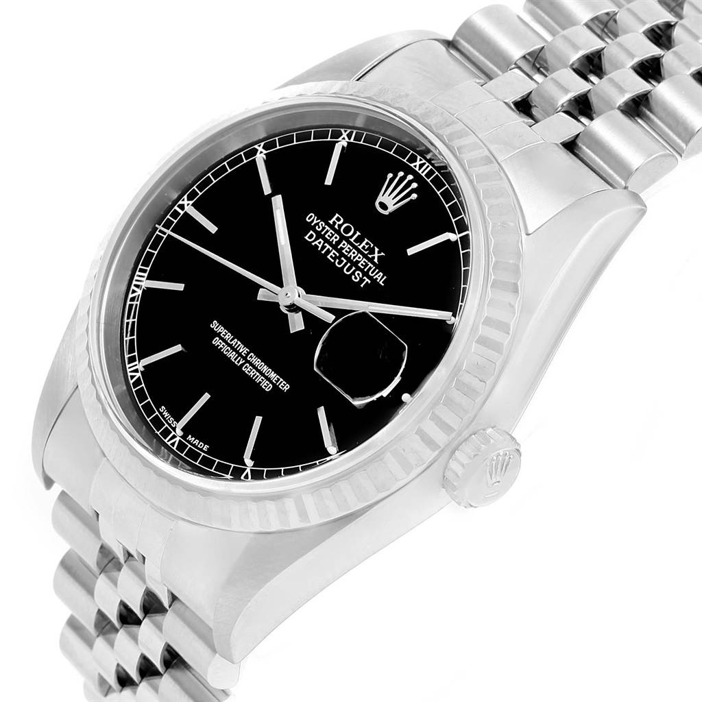 The image shows a Datejust model Rolex watch from an angled view, highlighting the face, bezel, crown, and part of the bracelet.