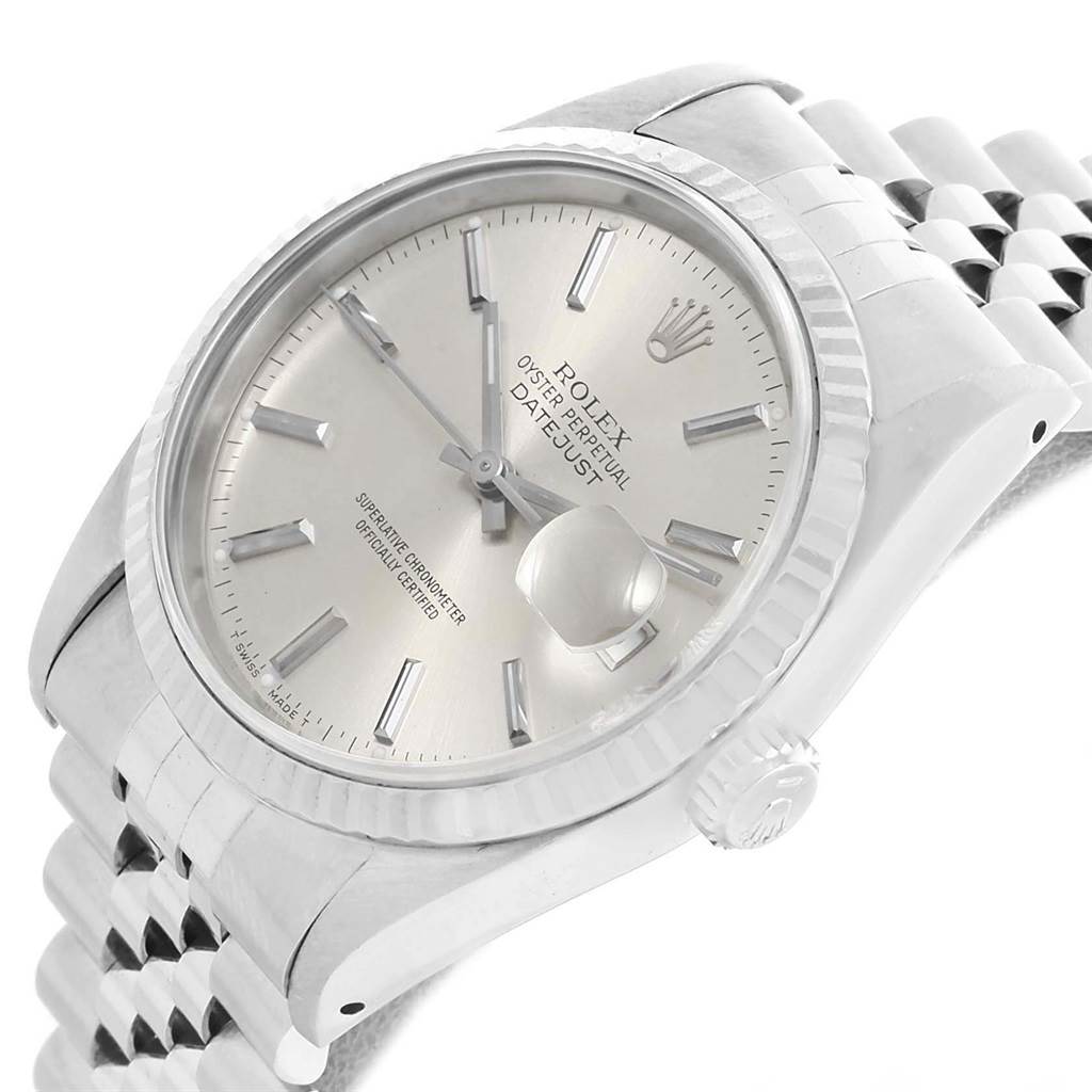 This image shows a close-up, angled view of the face and part of the bracelet of a Rolex Datejust 16234 Men's Stainless Steel Silver Dial 16234 Men's Stainless Steel Silver Dial watch.