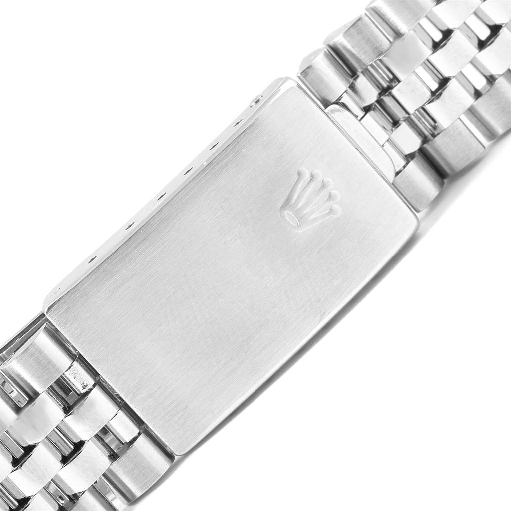 This image shows the clasp of a Rolex Datejust 16234 Men's Stainless Steel Silver Dial 16234 Men's Stainless Steel Silver Dial watch bracelet from a top-down angle.