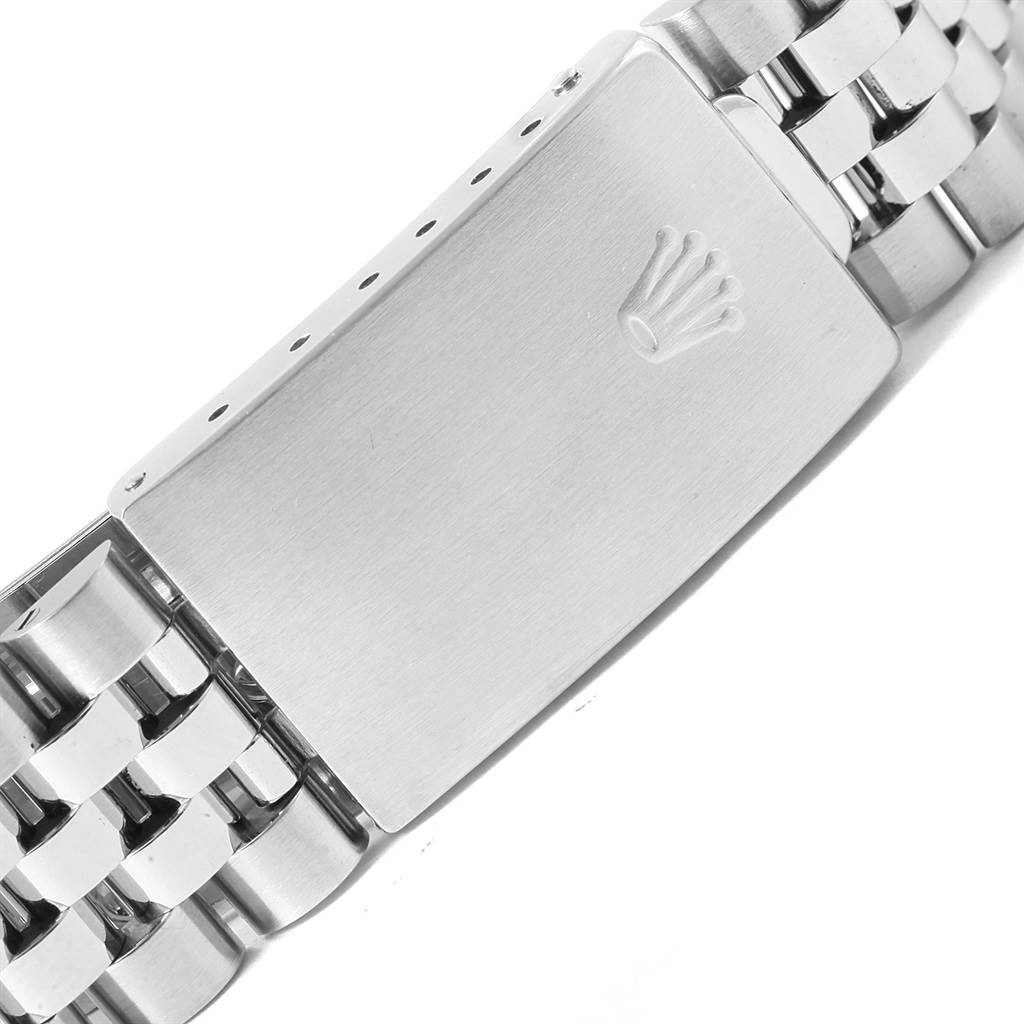 This image shows a close-up of the clasp and part of the bracelet of a Rolex Datejust 16234 Men's Stainless Steel Beige Dial 16234 Men's Stainless Steel Beige Dial watch.