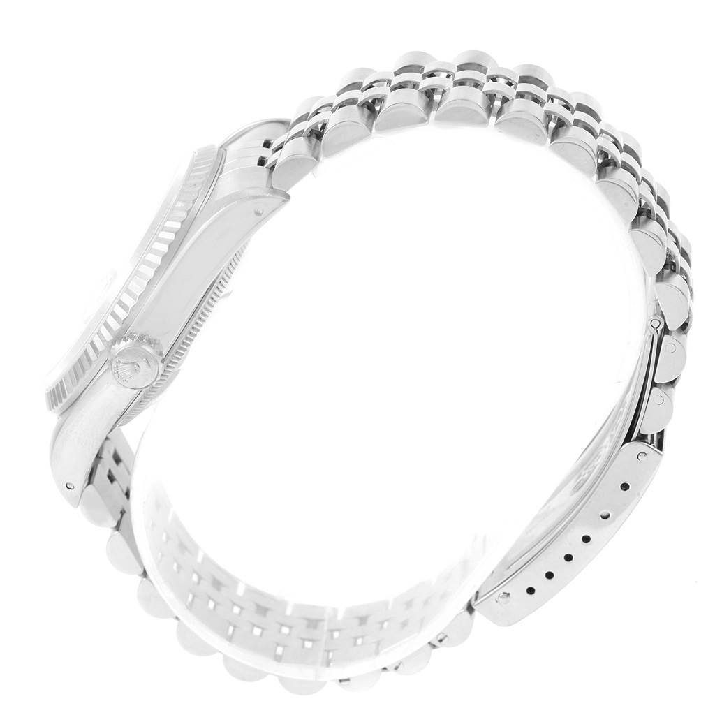 The image shows a side view of a Rolex Datejust 16234 Men's Stainless Steel Beige Dial 16234 Men's Stainless Steel Beige Dial watch, focusing on its bracelet and case.