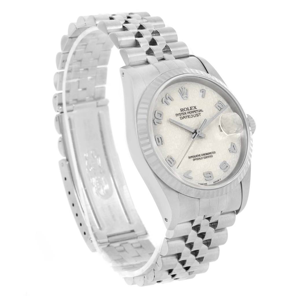 The image shows a side angle view of a Rolex Datejust 16234 Men's Stainless Steel Beige Dial 16234 Men's Stainless Steel Beige Dial watch, highlighting its face, bracelet, and clasp.