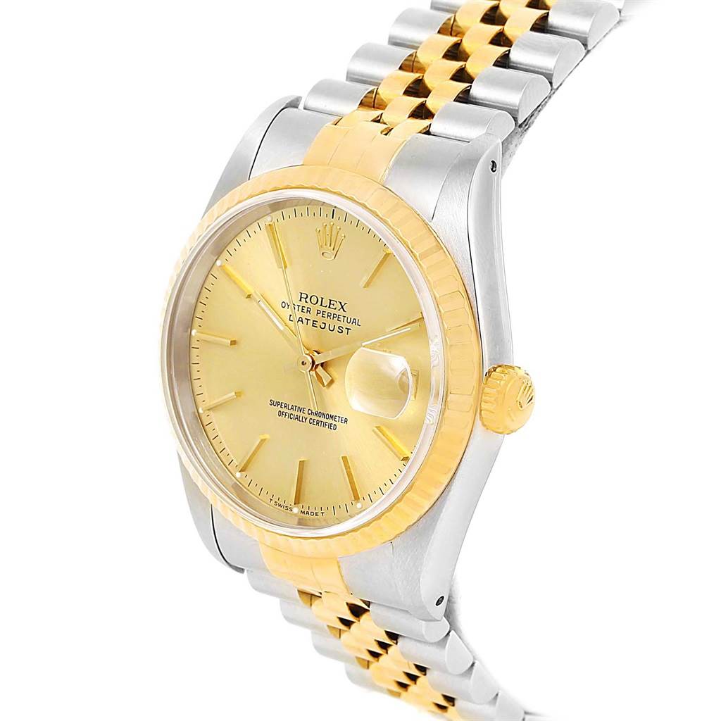 The watch shown is a Rolex Datejust 16233 Steel and Gold (two tone) Champagne Dial 16233 Steel and Gold (two tone) Champagne Dial model viewed from an angle showcasing the dial, bezel, crown, and part of the bracelet.