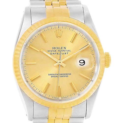 The image shows a front-facing angle of a Rolex Datejust watch, highlighting its yellow gold dial, bezel, and two-tone bracelet.