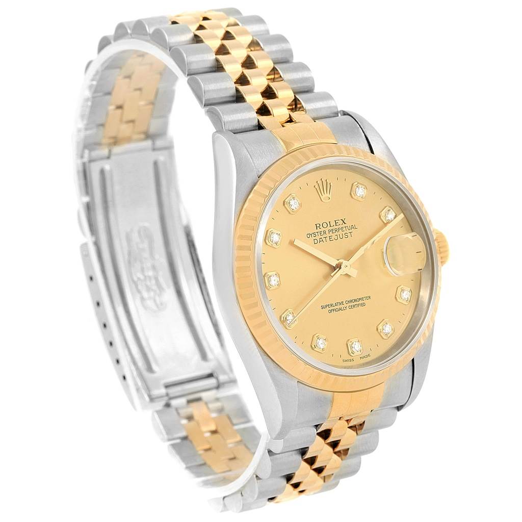 This image shows a Rolex Datejust 16233 Steel and Gold (two tone) Champagne Dial 16233 Steel and Gold (two tone) Champagne Dial watch at a slight angle, highlighting its gold and silver bracelet and champagne dial.