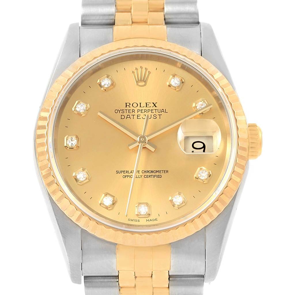 The image shows a frontal view of a Rolex Datejust 16233 Steel and Gold (two tone) Champagne Dial 16233 Steel and Gold (two tone) Champagne Dial watch, highlighting the dial, the bracelet, and the bezel.