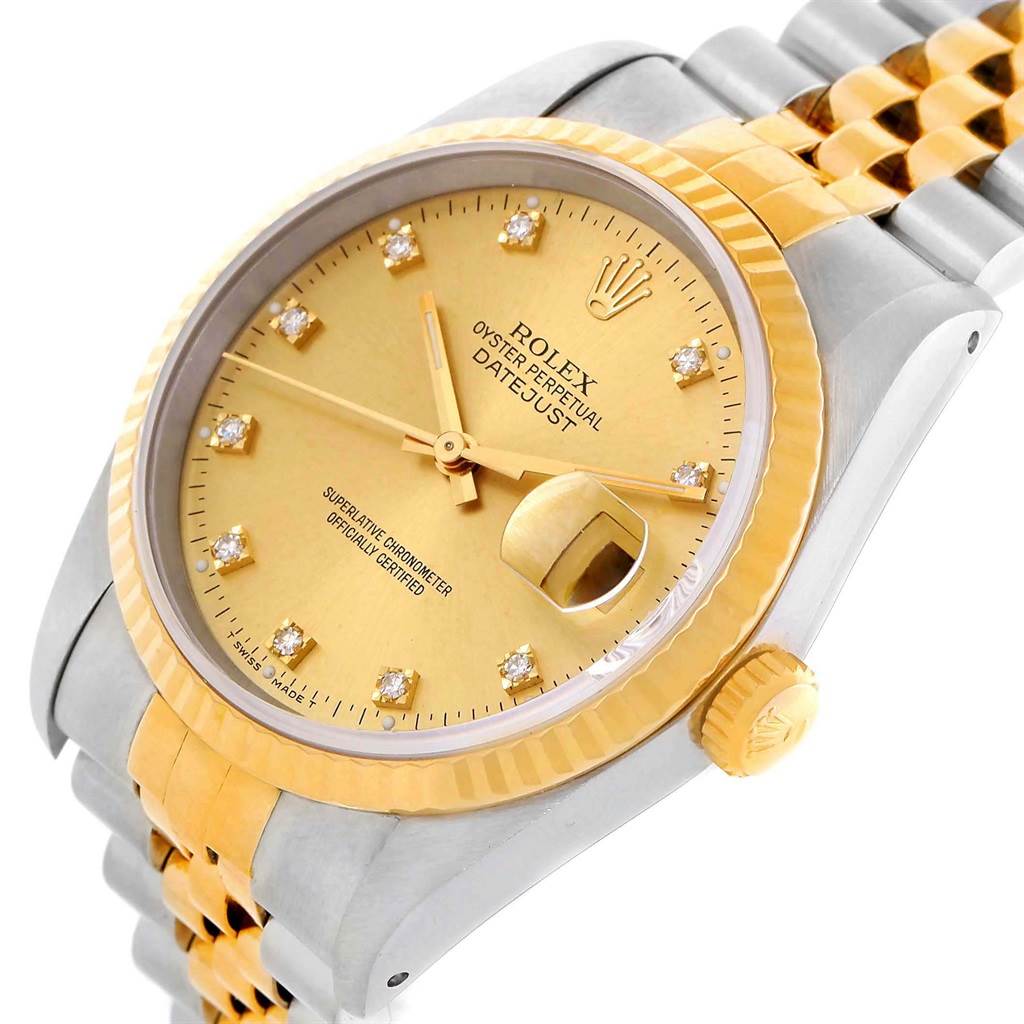 This image shows a close-up angle of a Rolex Datejust 16013 Stainless Steel Champagne Dial 16013 Stainless Steel Champagne Dial watch, highlighting the dial, bezel, crown, and part of the bracelet.