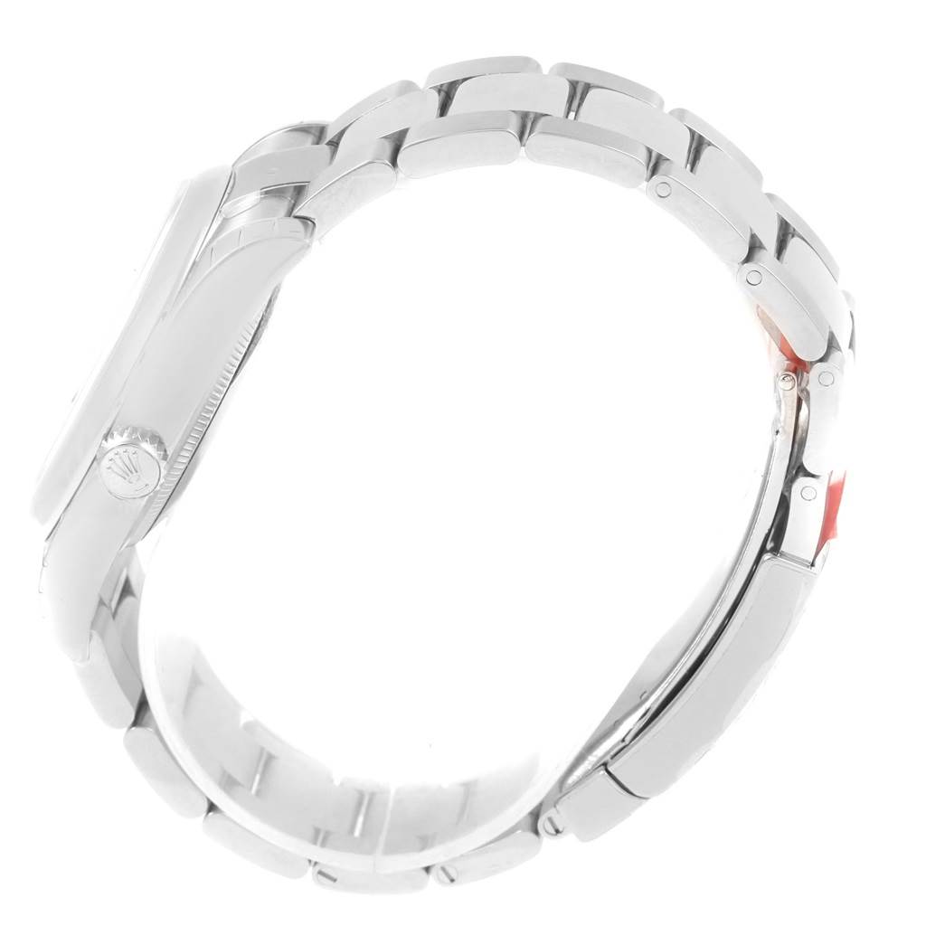 This image shows a side profile of a Rolex Datejust 116200 Men's Stainless Steel Silver Dial 116200 Men's Stainless Steel Silver Dial watch, highlighting the crown and part of the bracelet.