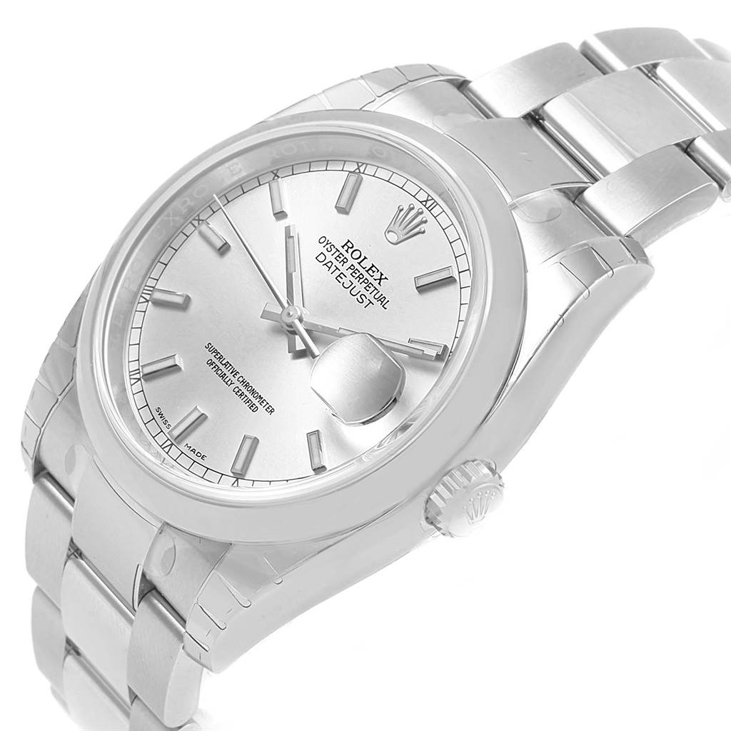 The Rolex Datejust 116200 Men's Stainless Steel Silver Dial 116200 Men's Stainless Steel Silver Dial watch is shown at an angled view, displaying its face, bracelet, and crown.