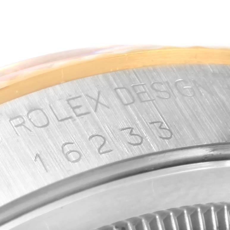 This close-up image shows the engraved reference number "16233" on the case of a Rolex Datejust 16233 Steel and Gold (two tone) Champagne Dial 16233 Steel and Gold (two tone) Champagne Dial watch.