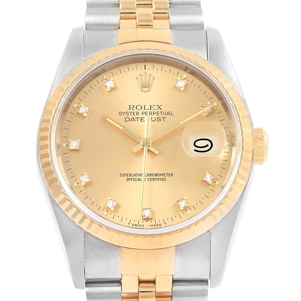 The image shows a front view of the Rolex Datejust 16233 Steel and Gold (two tone) Champagne Dial 16233 Steel and Gold (two tone) Champagne Dial watch, highlighting its gold dial, bezel, and two-tone bracelet.