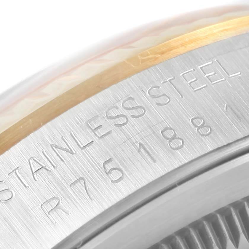 Close-up of the side of a Rolex Datejust 16233 Steel and Gold (two tone) Champagne Dial 16233 Steel and Gold (two tone) Champagne Dial watch showing the stainless steel case and part of the serial number.