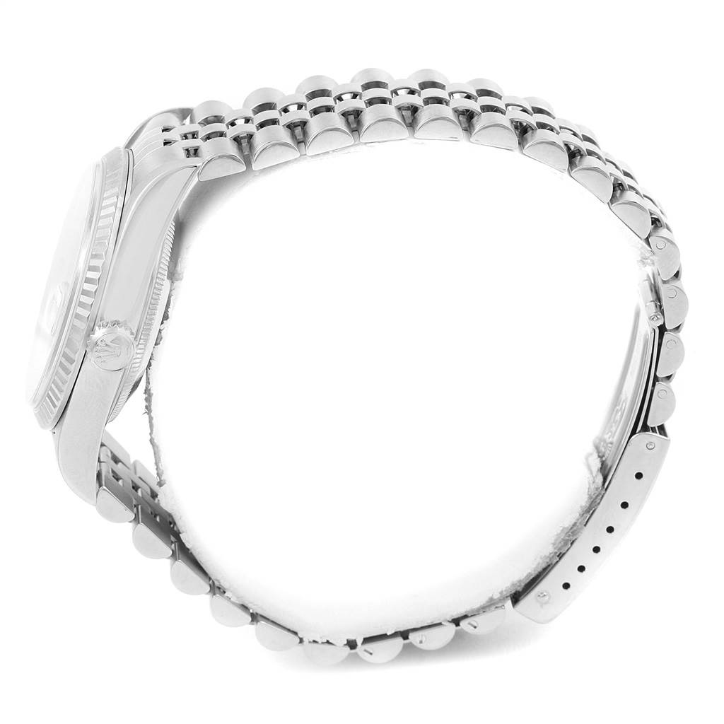 The image shows a side view of a Rolex Datejust 16234 Men's Stainless Steel Black Dial 16234 Men's Stainless Steel Black Dial watch, highlighting its case, bezel, and bracelet.