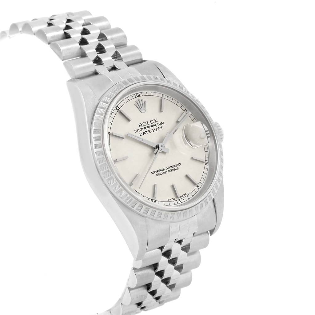 The Rolex Datejust 16220 Men's Stainless Steel Silver Dial 16220 Men's Stainless Steel Silver Dial watch is shown at a slight side angle, displaying the bracelet, watch face, and bezel.
