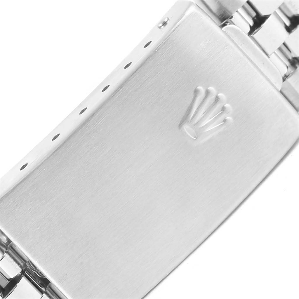 This image shows a close-up view of the clasp of a Rolex Datejust 16220 Men's Stainless Steel Silver Dial 16220 Men's Stainless Steel Silver Dial watch, featuring the Rolex crown logo.